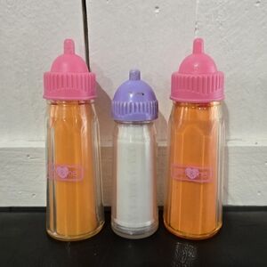Baby doll bottles disappearing milk orange juice Magic 2 You & Me one unbranded